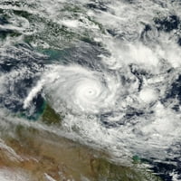 Április 11, - műholdas nézet az ITA trópusi Ciklonról, amely partra száll a Queensland keleti Cape York-félszigeten,